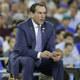 Illustration for article titled Eight Photos Of Coach K Sitting On A Lil Stool